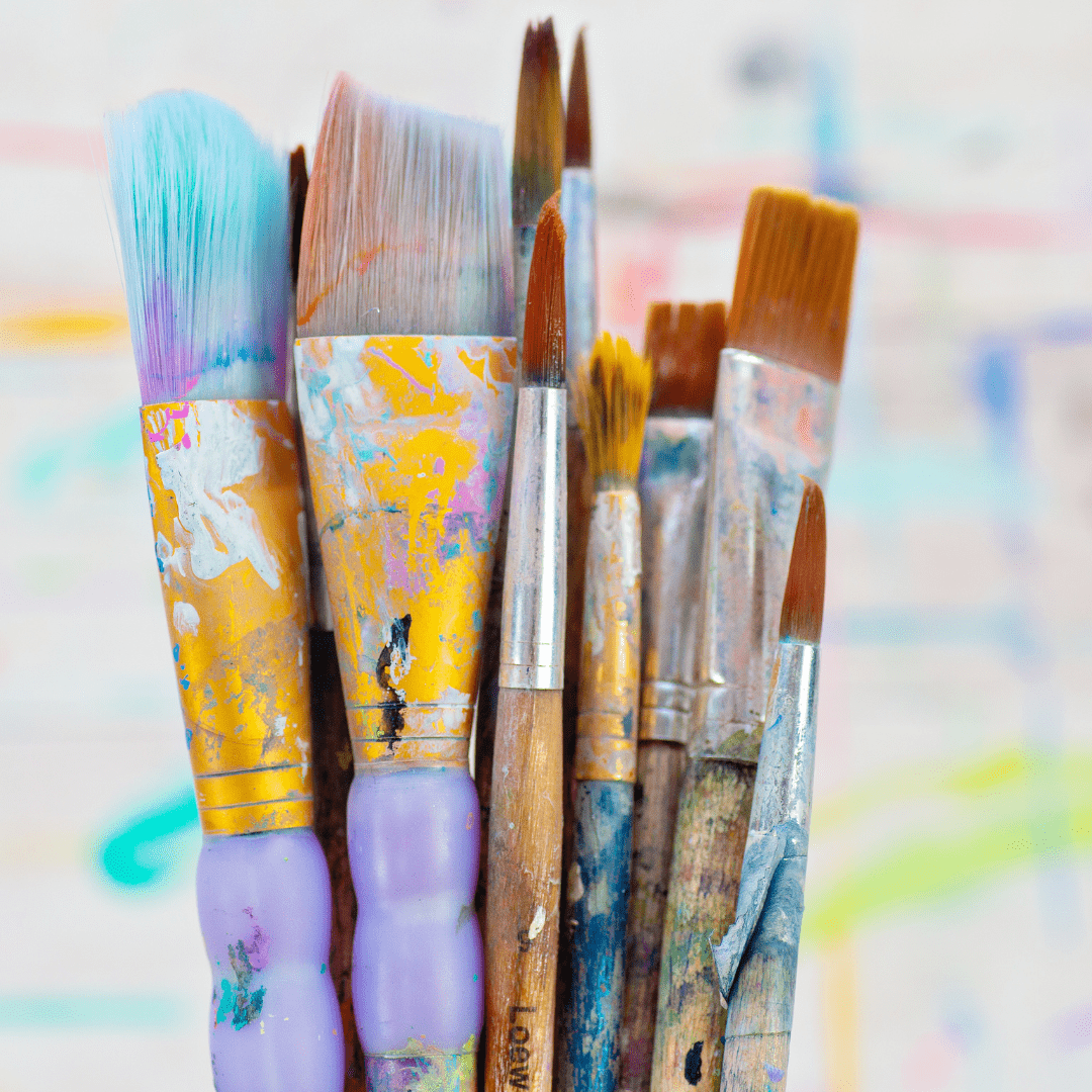 Paint covered paint brushes