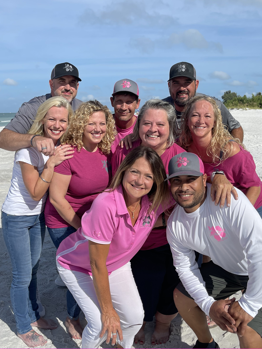 Anna Maria Life Vacation Team members on the beach Rentals
