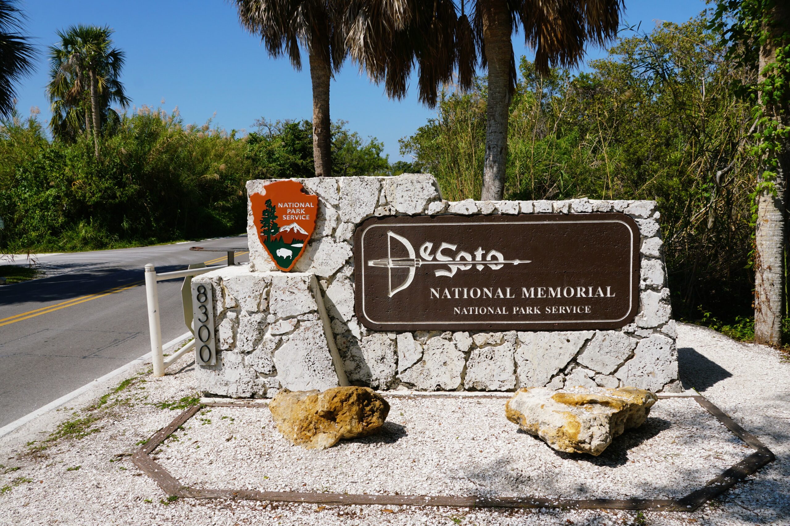 Bradenton, Florida, U.S.A - March 27, 2026 - Stone entrance sign for De Soto National Memorial with National Park Service plaque